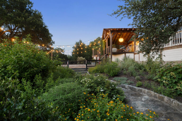 gravel-garden-path-live-oaks-yucca-drift-out-west-driftwood-tx